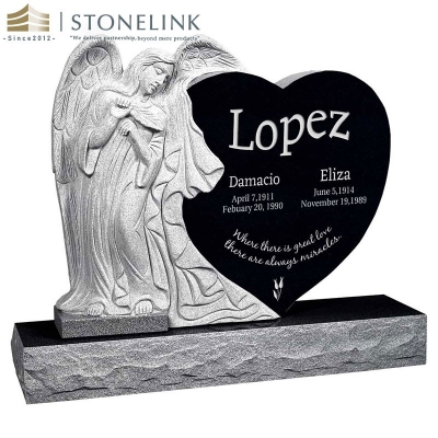 Leaning angel heart-shaped granite headstone