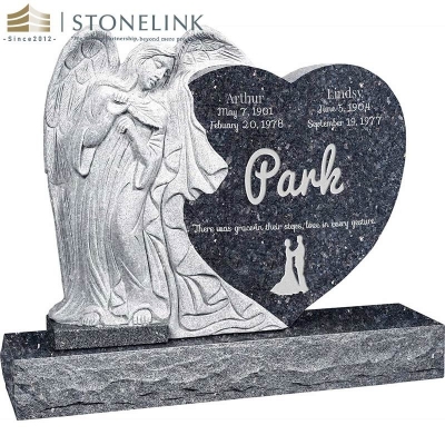 Leaning angel heart-shaped granite headstone